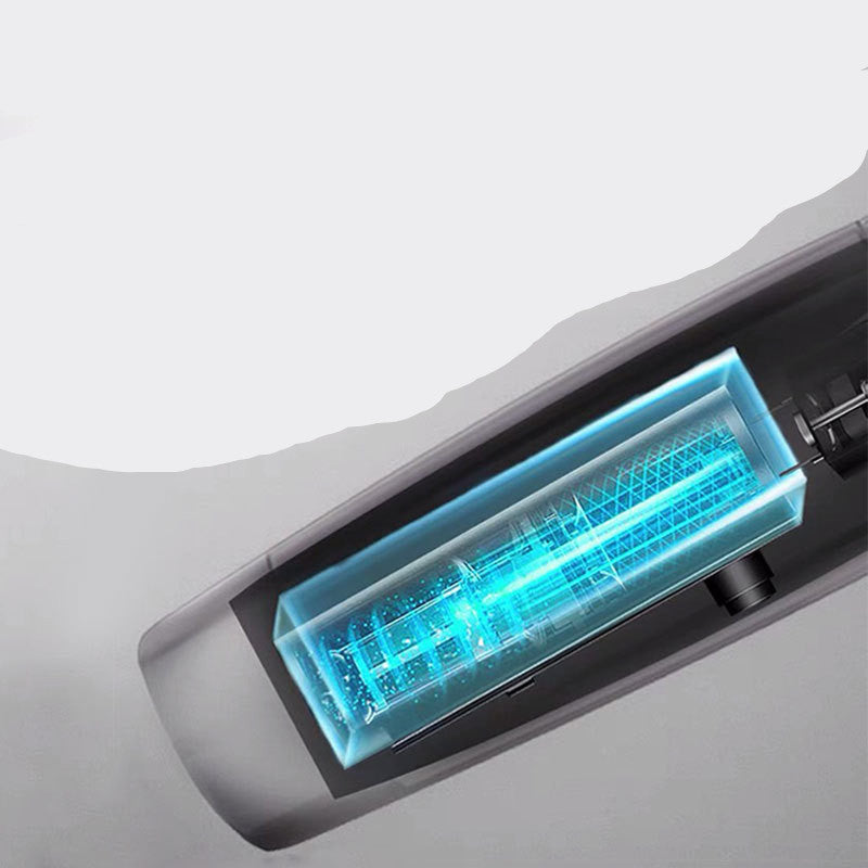 Close-up of a car's undercarriage with a blue light, likely an LED strip, on a gray background.