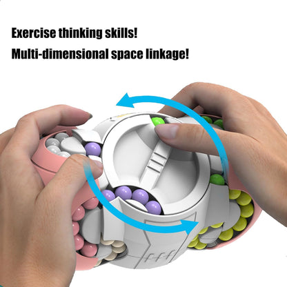 Rotating fidget cube toy with gray interior and colorful bead rings, shown in hands