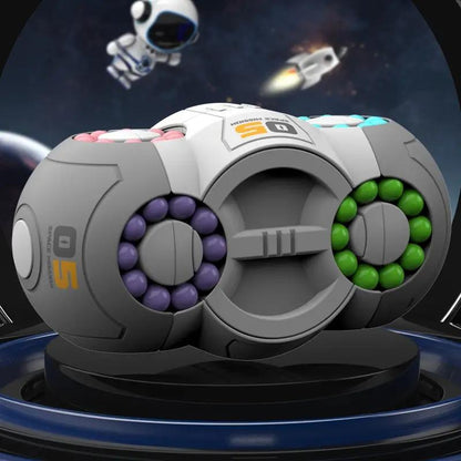 Rotating fidget cube toy with gray center and purple and green bead rings