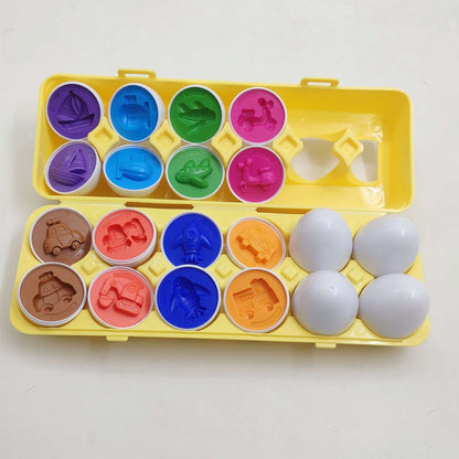 Colorful mold set with various shapes on a yellow tray against a white background