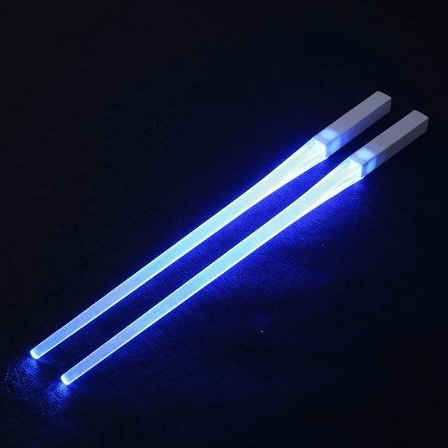 A reusable party utensil with nine colored fluorescent sticks and glowing chopsticks