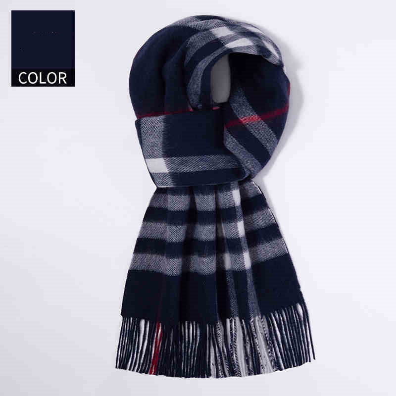 Plaid scarf with fringes on a white background