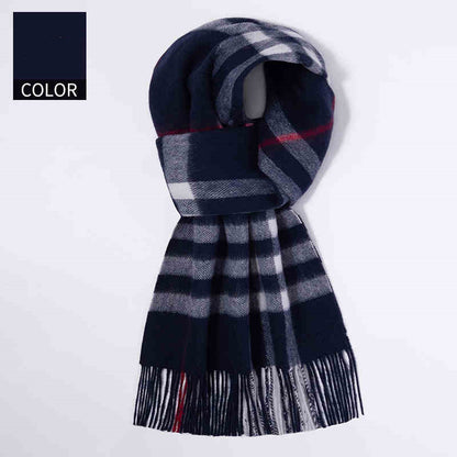 Plaid scarf with fringes on a white background