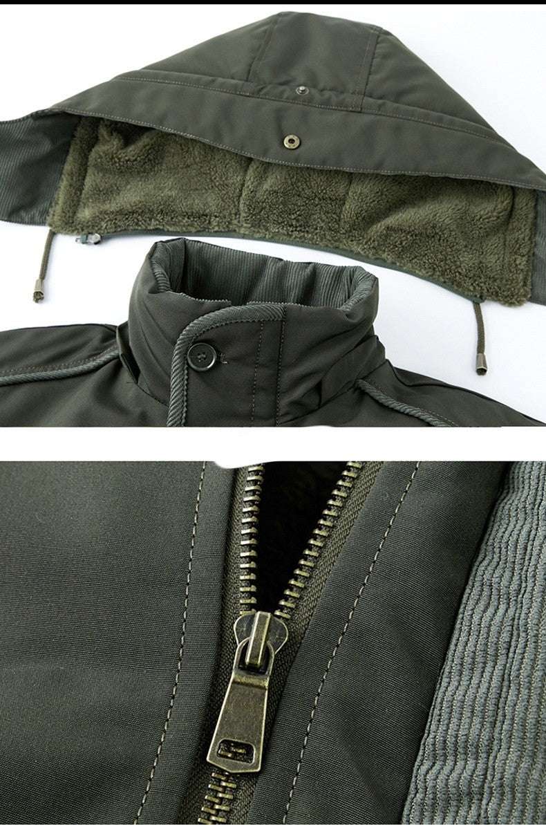 Close-up of a green jacket with hood and zipper on a white background