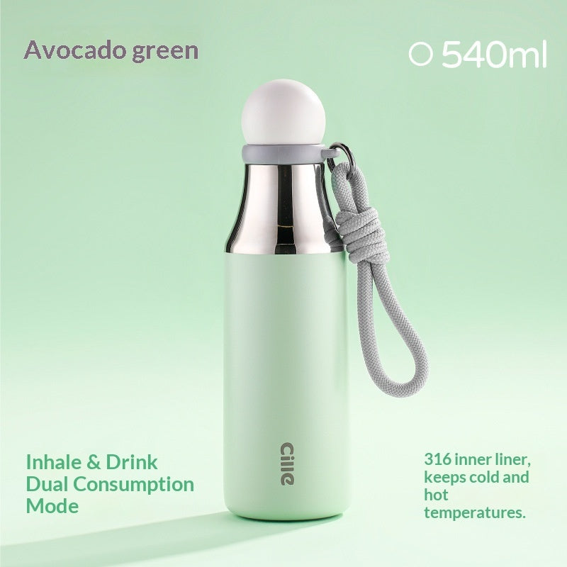 Insulated thermos mug in avocado green with stainless steel body and gray loop carry cord.