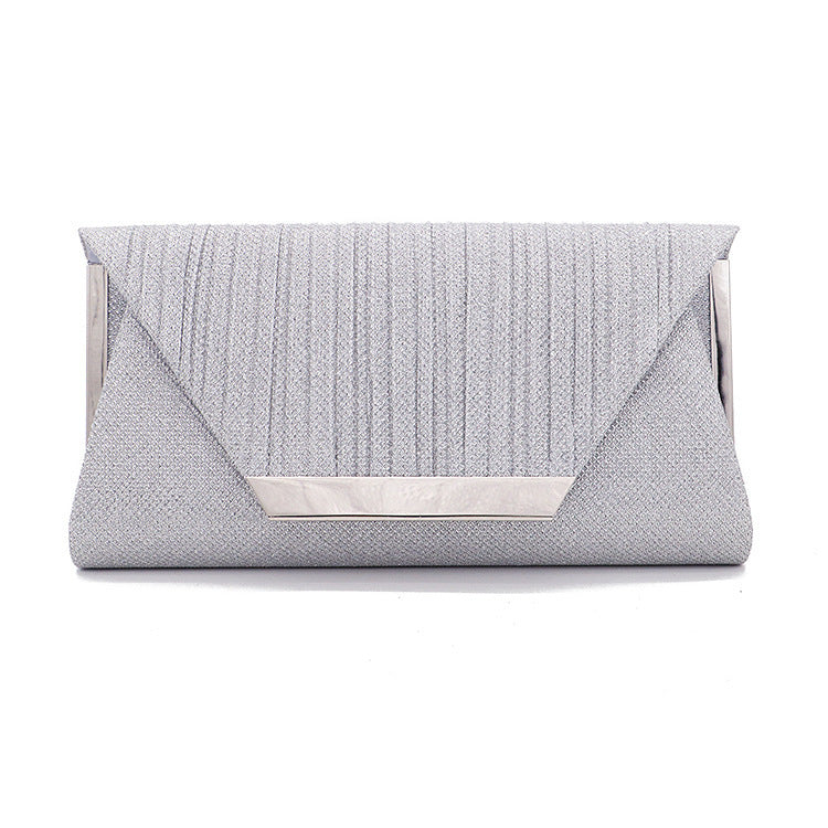 Silver-gray textured clutch bag with gold-tone rectangular clasp frame