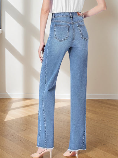 Women's light blue wide-leg denim pants, back view with two back patch pockets.