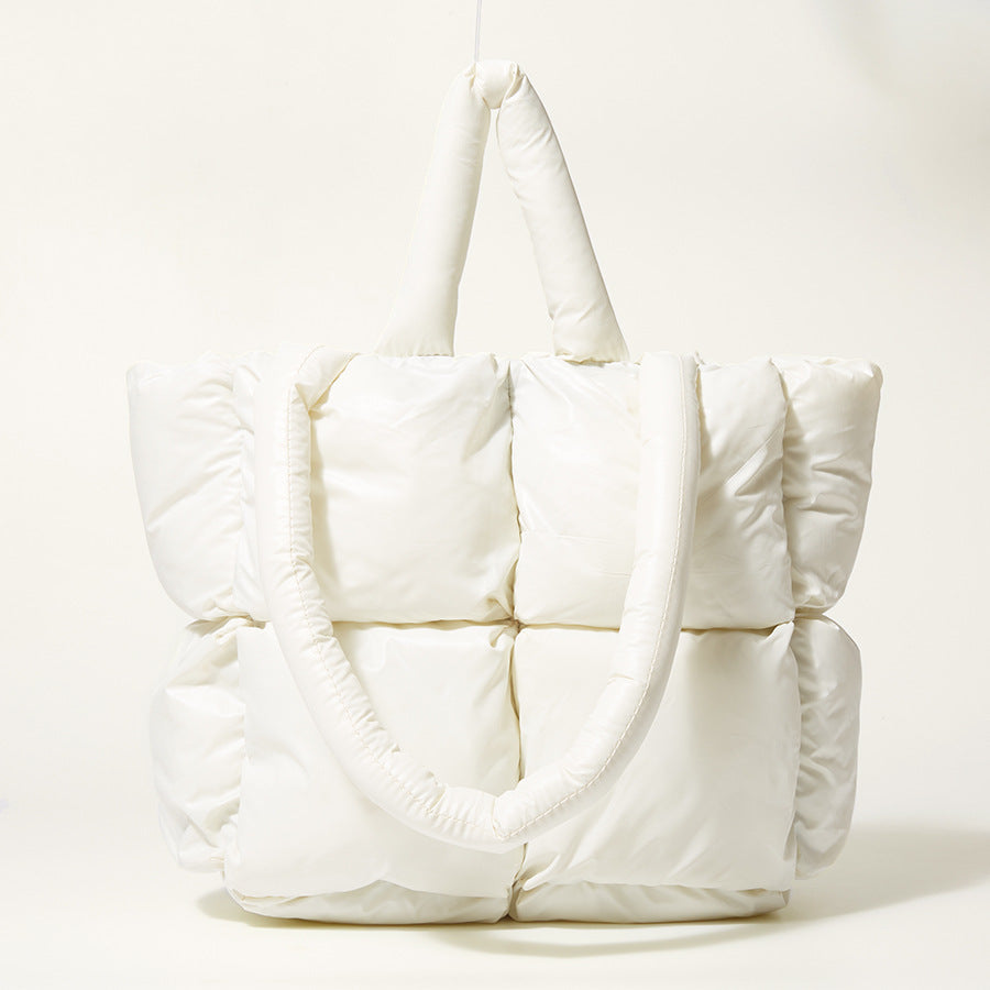 White puffy one-shoulder handbag with quilted panels and ruched side details
