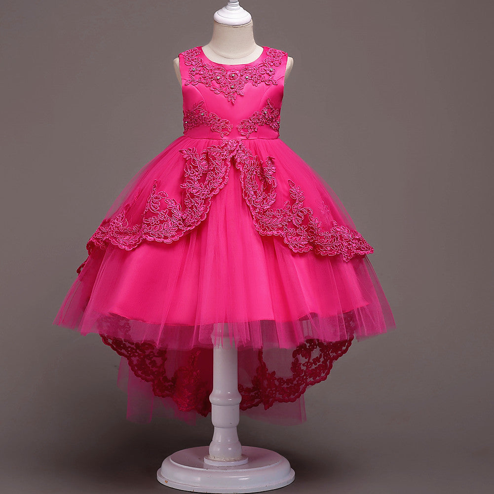 Hot pink sleeveless princess dress with embroidered lace appliques and tulle skirt