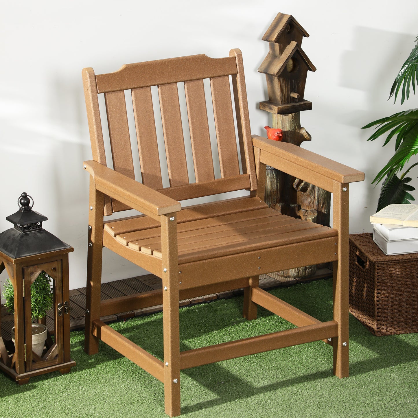 Brown outdoor patio dining chair with slatted back and seat, armrests; side view.