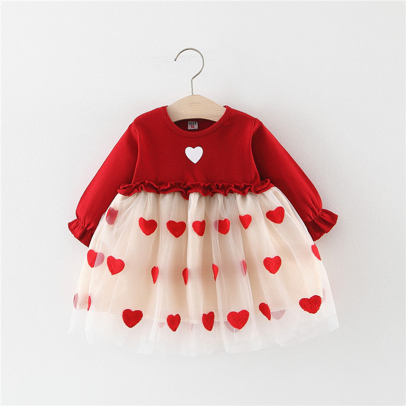 Baby girl dress in red with long sleeves, layered tulle skirt with red heart pattern