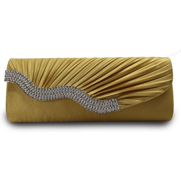 Gold pleated clutch with rhinestone wave detail