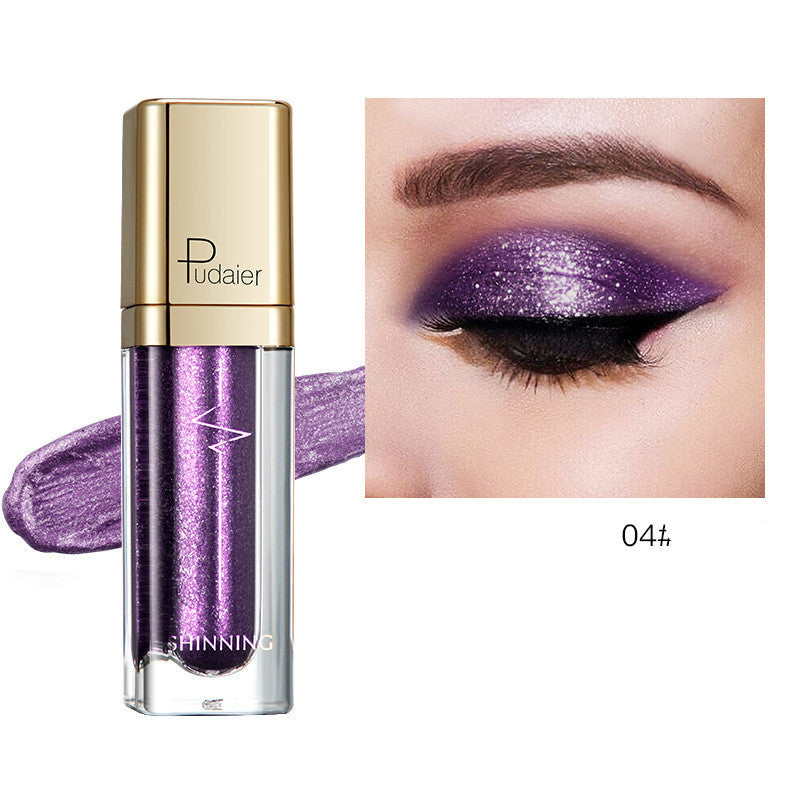 Glitter eyeshadow tube with purple shimmer and matching eyelid swatch, Tudaier