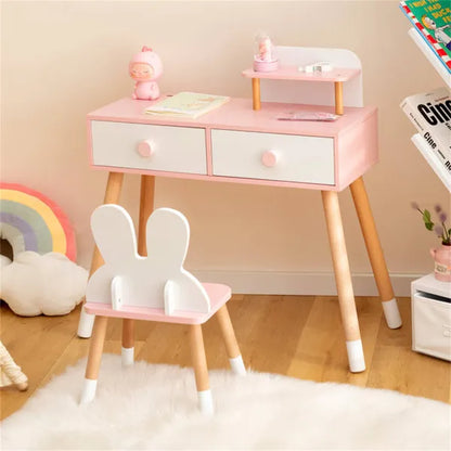 Pink kids vanity table with two drawers and round mirror, paired with twin bunny stool