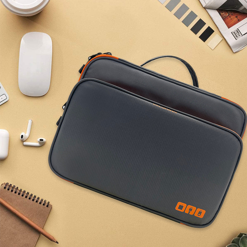 Travel tech storage bag in gray, front view with zipper pocket and carry handle