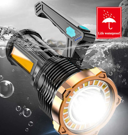 Black flashlight with orange ring COB front and lit yellow side window