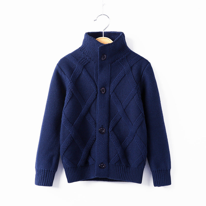 Dark blue knitted kids sweater coat with stand collar and button-front, textured diamonds
