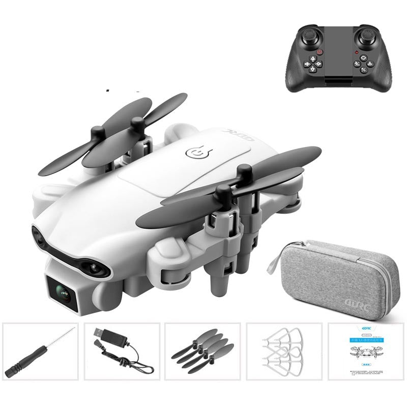 Mini white drone side view with gray carrying case and accessory pieces shown
