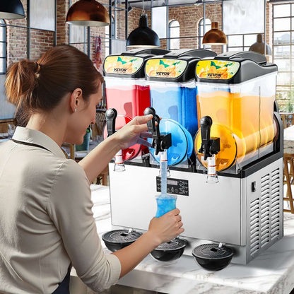 Three-tank commercial slushy machine with dispensing faucet in use