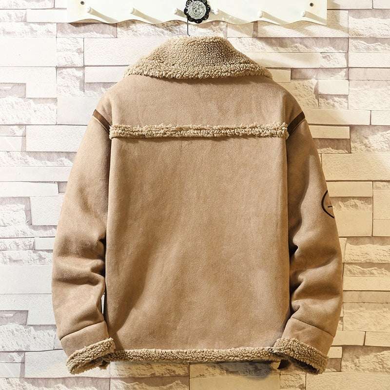 Beige jacket with fur trim hanging against a wooden paneled wall.
