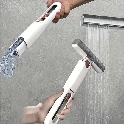 Hand-free mini mop with white handle and gray scrubbing head for cleaning floors