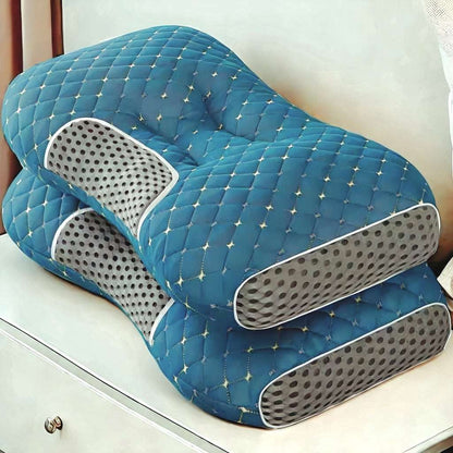 Blue quilted massage pillow pair with perforated side panels and curved inner cutout