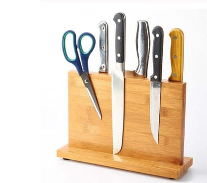 Wood magnetic knife holder with upright slots and five visible knives