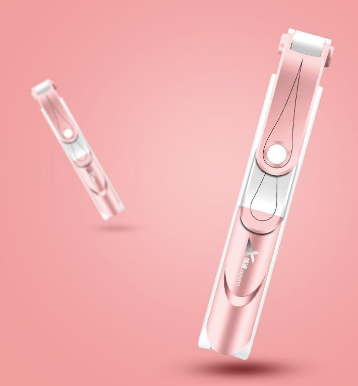 Pink and white selfie stick and tripod with phone holder