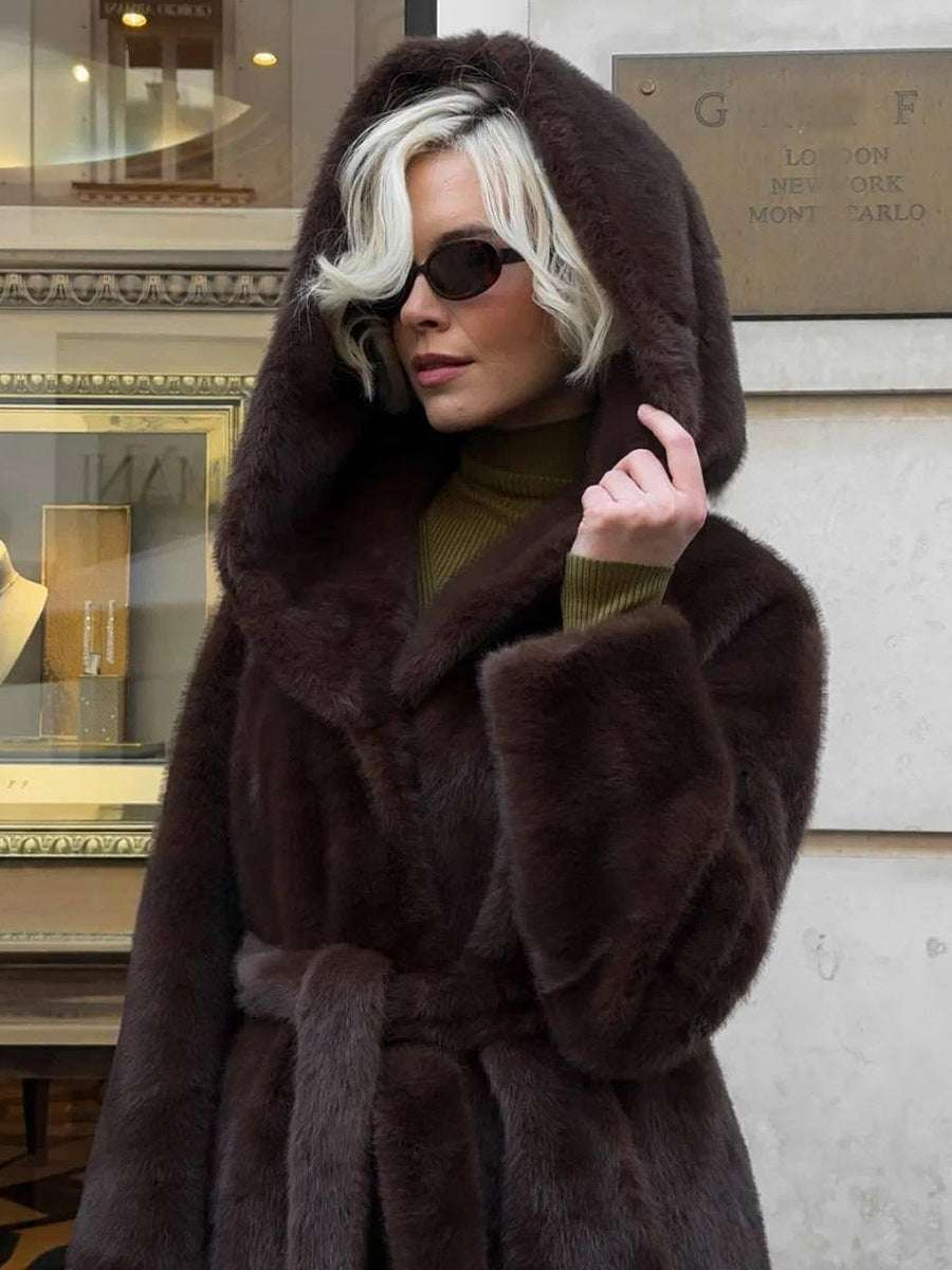 Women's long hooded coat in dark brown faux fur with wide hood and belt