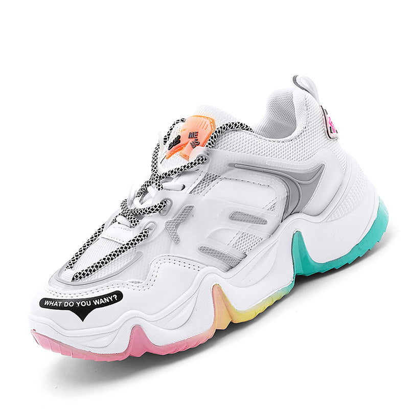 White women’s rainbow sneakers with turquoise sides, teal outsole, and pink edge sole