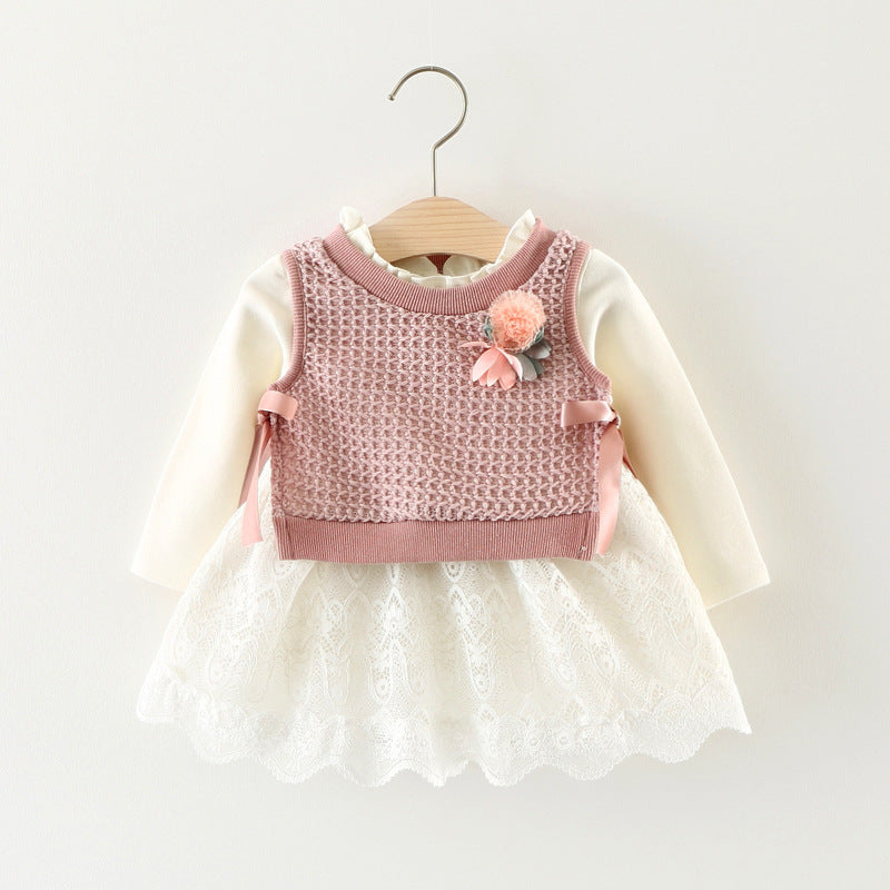 Baby girl dress in cream with long sleeves, pink textured bodice, flower and lace skirt