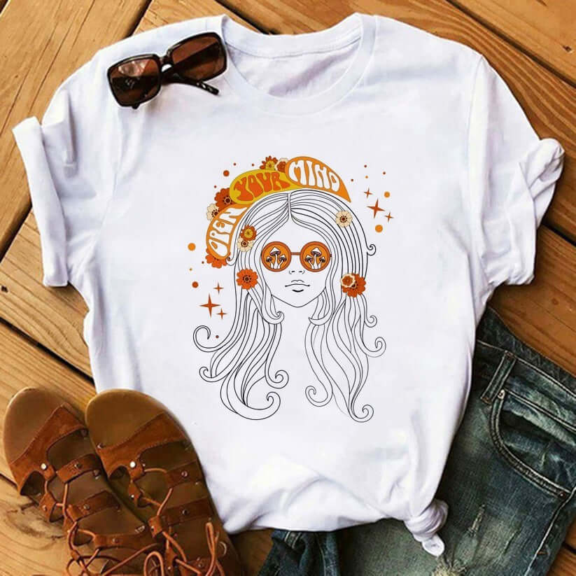 90's Funny Mushroom Print T-shirt Casual Round Neck Short Sleeves Printed Pullover Women T-shirt on wooden surface with sunglasses.