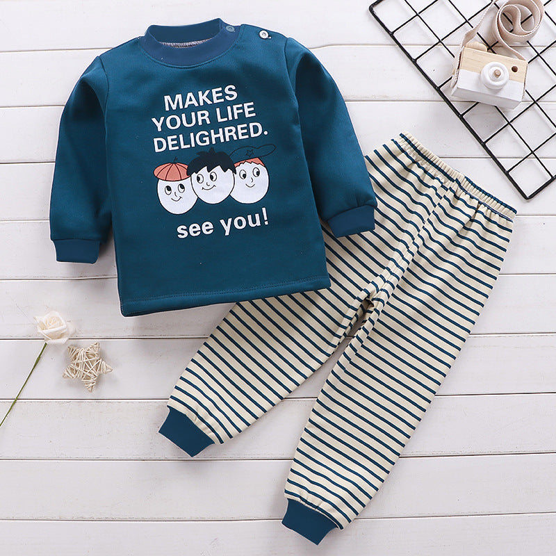 Kids thermal underwear set in teal with cartoon print, striped pants included.