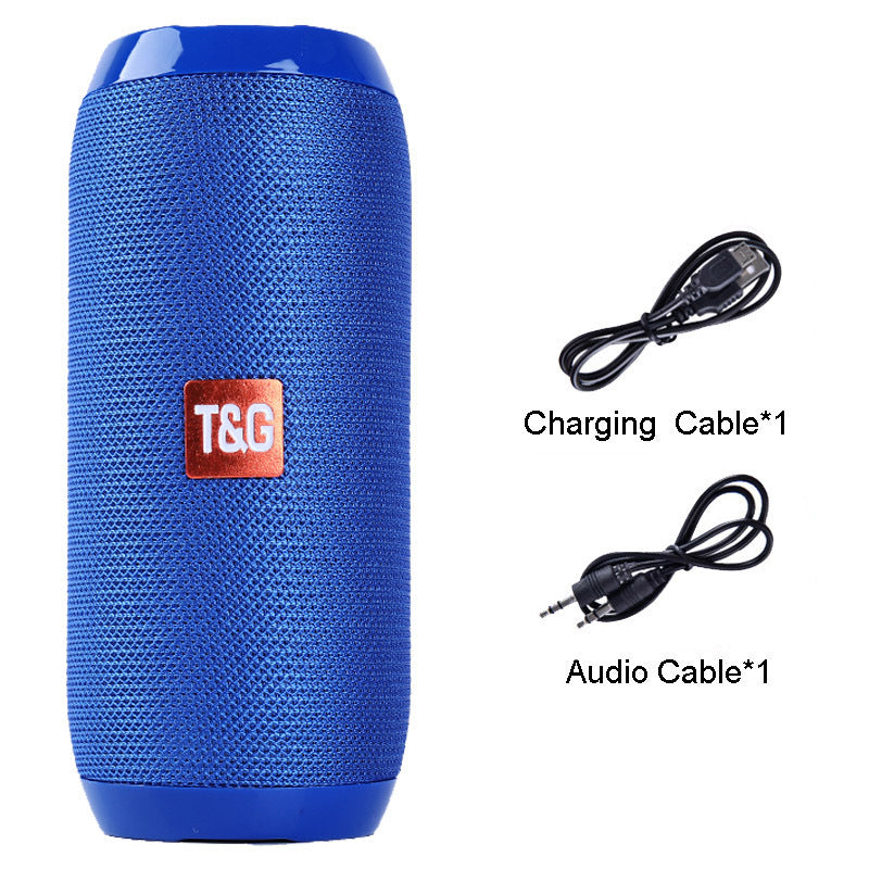 Bluetooth speaker, blue mesh cylinder with T&G logo, shown with charging and audio cables.