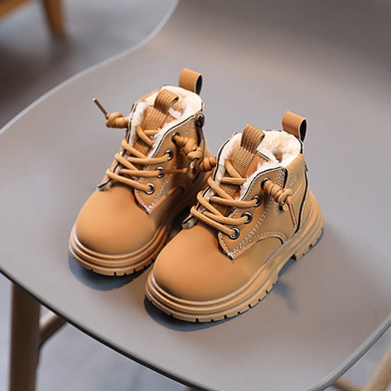 Tan baby lace-up boots with soft lining and contrast laces, rounded toe and chunky sole