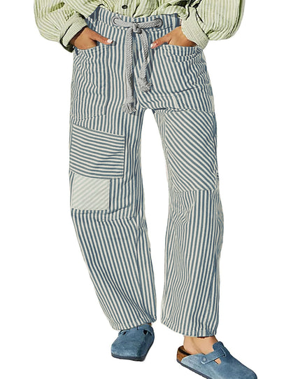 Light blue-and-white striped wide-leg trousers with drawstring waist and patch pockets