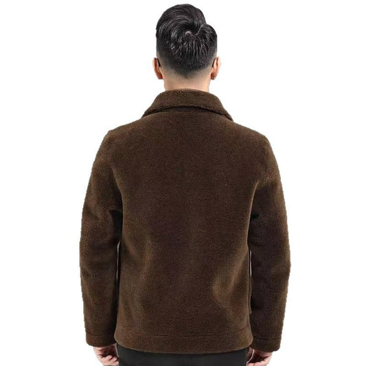 Man wearing a brown jacket from behind on a white background