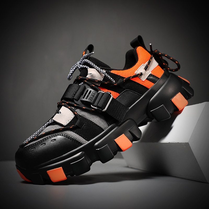 Men’s casual chunky sneakers, black with orange accents and gray mesh vamp