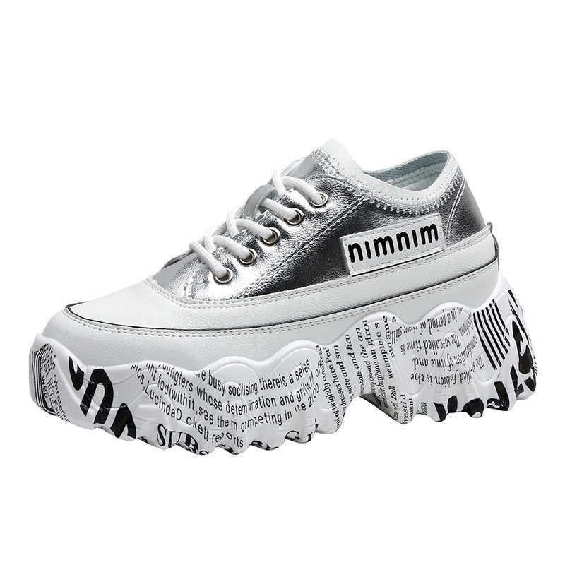 Silver platform sneakers with lace-up front and printed chunky sole