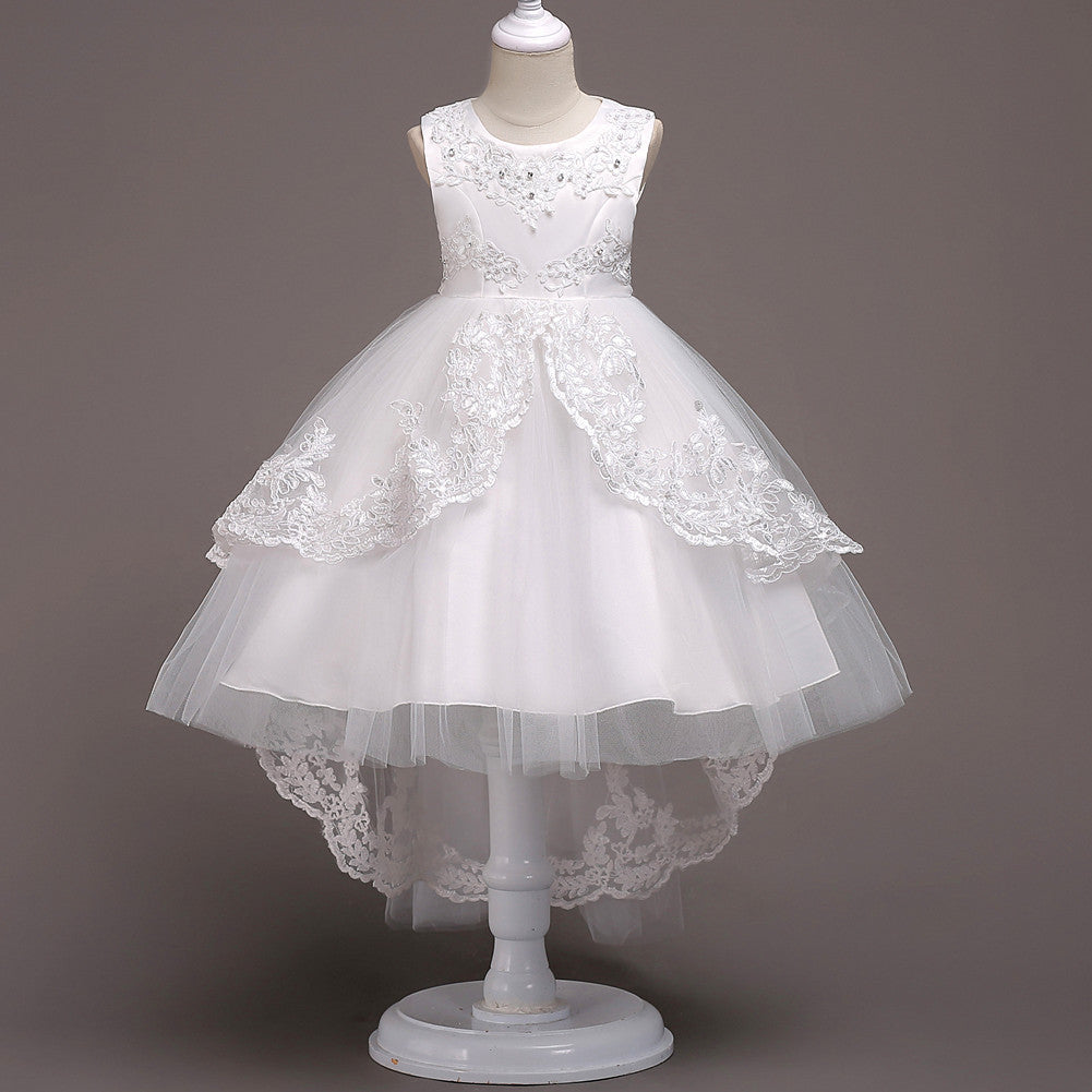 White sleeveless princess dress with lace bodice and layered tulle skirt