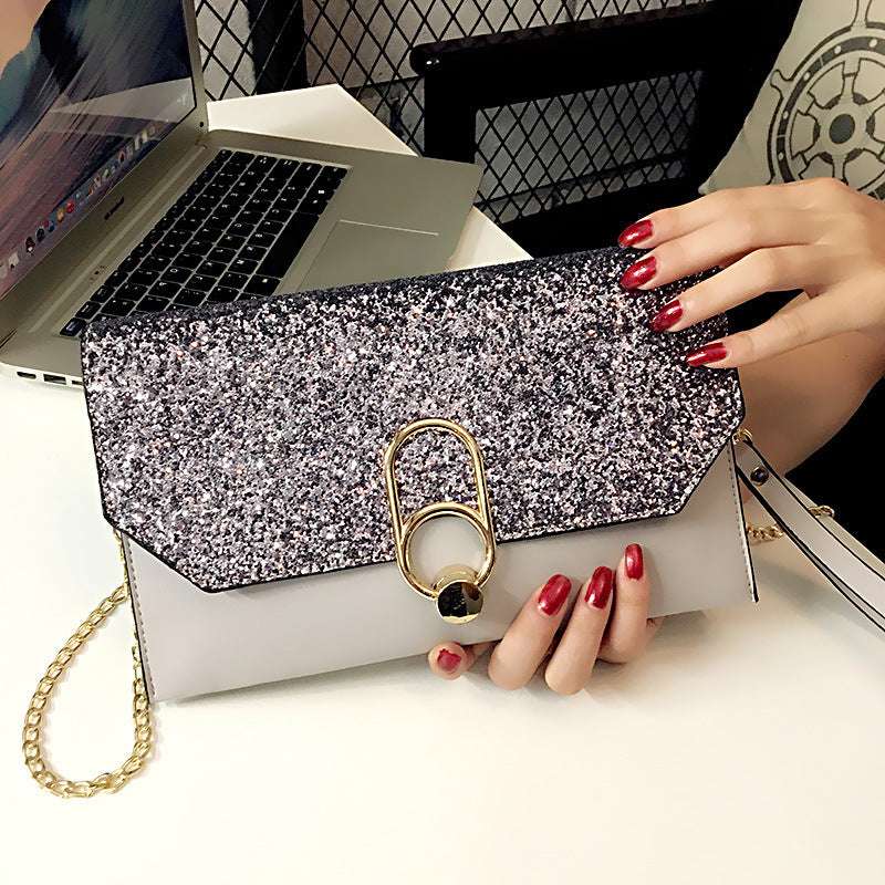 Glitter envelope clutch bag with gold ring clasp, light grey flap and chain