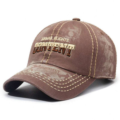 Washed brown baseball cap with embroidered front logo, curved brim, contrast stitch detailing