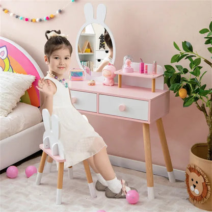 Kids vanity table with round mirror, pink tabletop, two drawers, and white twin bunny stool