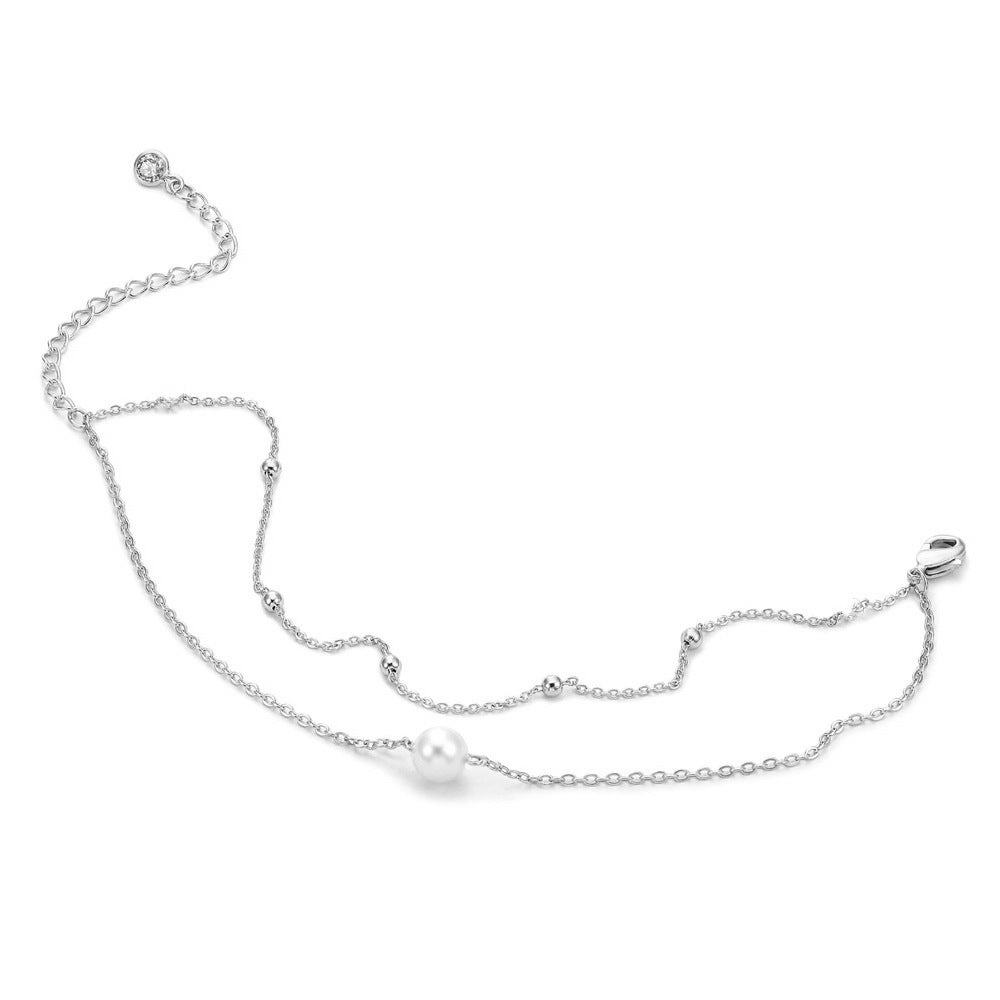 Silver tone double-strand bead chain bracelet with pearl and small charm at clasp