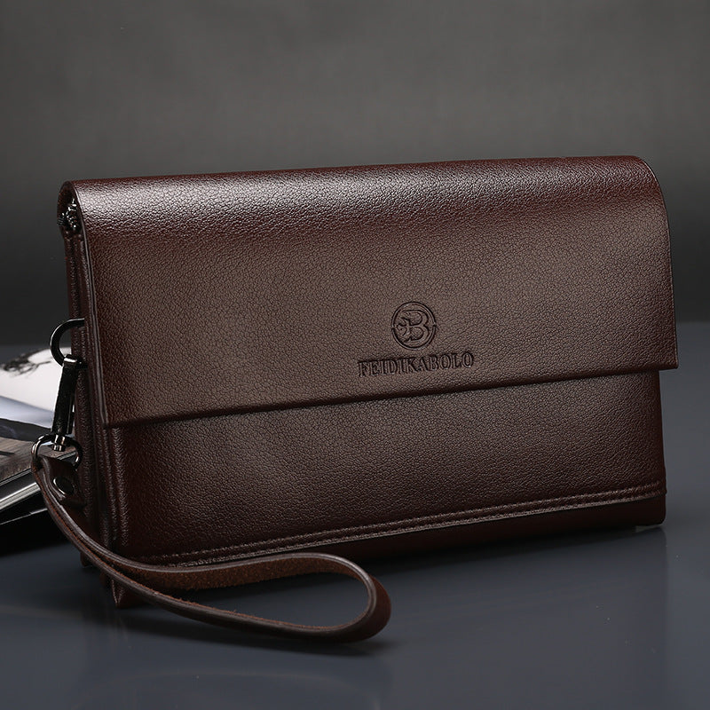 Brown leather flap business bag with logo and wrist strap