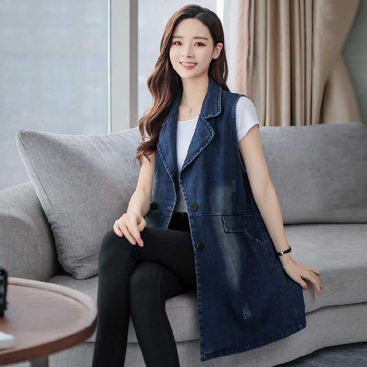 Denim vest coat with deep V lapel, double-button front, and patch pockets