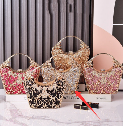 Women’s hollow out shiny clutch with ornate filigree, rhinestone flower, gold and pink
