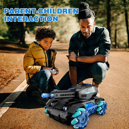 RC stunt tank toy on ground; dark gray body with light-blue 4WD wheels