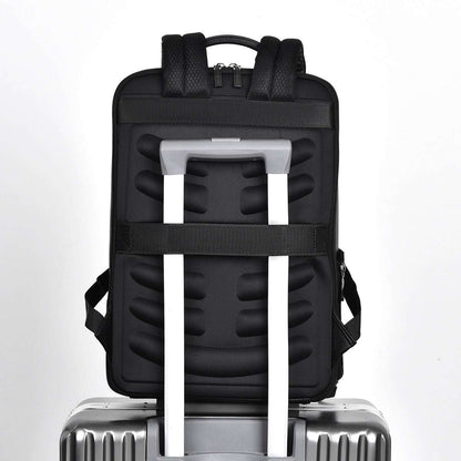 Black computer backpack with padded back panel and luggage strap centered