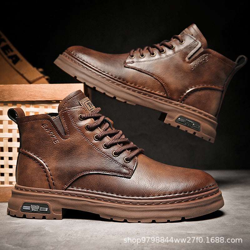 Brown mid-top lace-up boots with thick sole and lace panel detail.